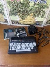 Commodore Plus/4 Computer With Power Cord 2 Books And Another Cable Turns On picture