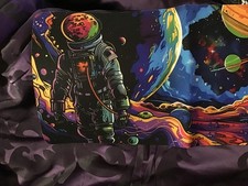 nice mousepad, game mat, or desk mat with astronaut in space design. 11x20 picture