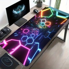 A Large Gaming Mouse Pad Featuring a Colorful Neon Hexagonal Tunnel Design Tha picture