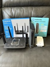 Motorola Cable Modem + LinkSys Wireless Router + LinkSys Extender picture
