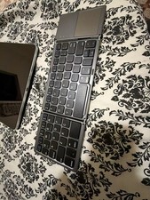 Jelly Comb Foldable Bluetooth Keyboard with Touchpad and Numeric Keypad Gray picture