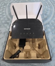 NETGEAR AX1800 1000 Mbps 4 Port Wireless Router (RAX10-100NAS) picture