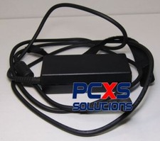 Regulated AC power adapter - Rated at 65 Watts, 87% max. efficiency (EFF), 19.5V picture