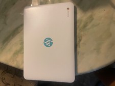 White & Blue HP Chrome laptop computer  picture