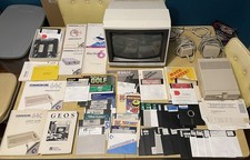 Commodore C64 lot. 5.25” drive, 30+ discs, manuals, magnavox monitor picture