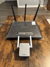 NetGear Nighthawk AC1900 WiFi Router and NetGear AC750 WiFi Range Extender. picture