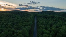 Landscape aerial view road highway clouds trees forest Custom Gaming Mat Desk picture