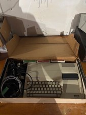 Texas Instruments Ti-99/4A Vintage Home Computer with Manuals and classic games picture